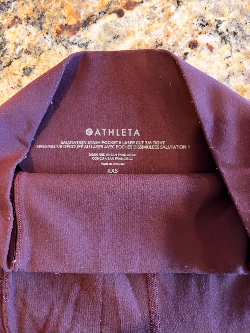 Athleta 7/8 Salutation Stash Pocket Tight in Burgundy
